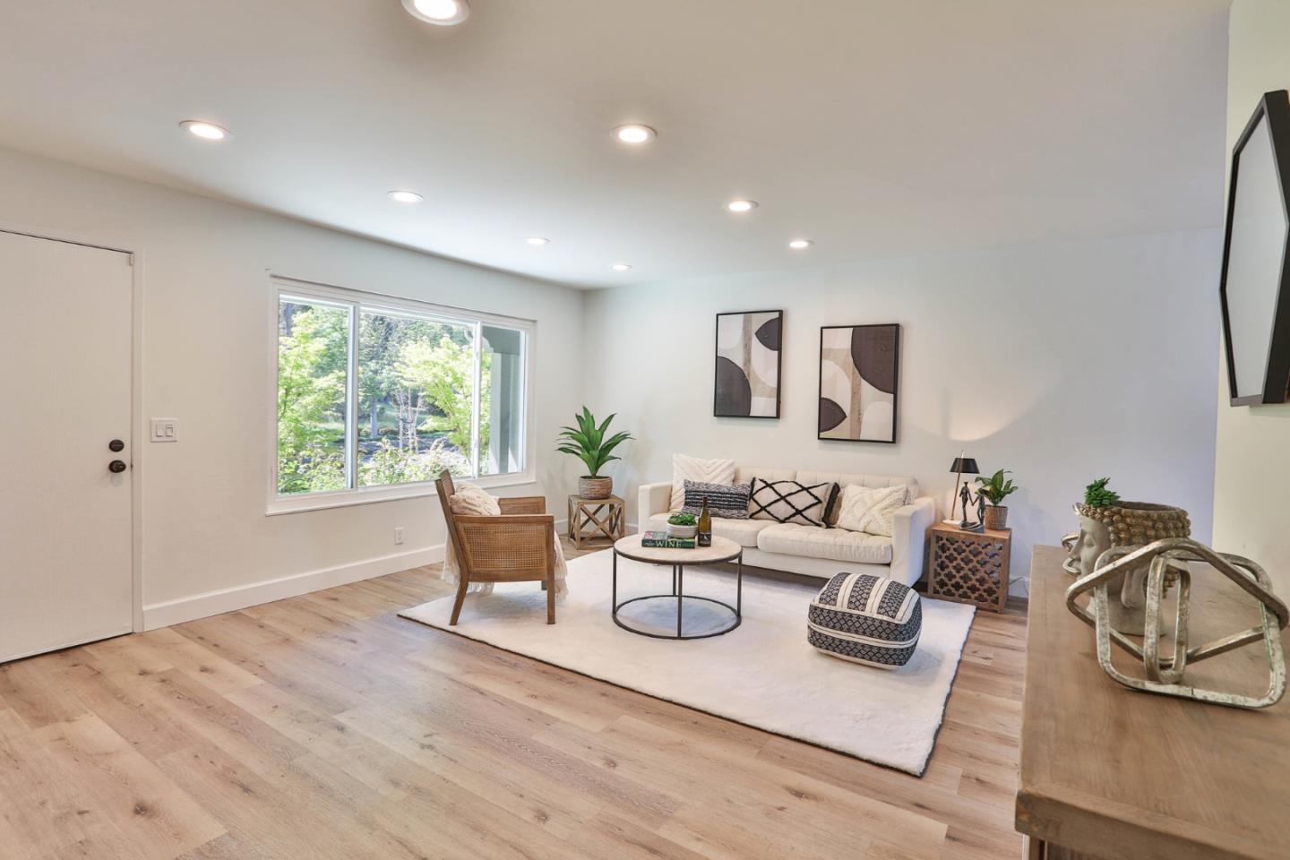 2840 Bollinger Canyon Road San Ramon, CA 94583 - Photo 4 of 23 a living room with furniture and a window
