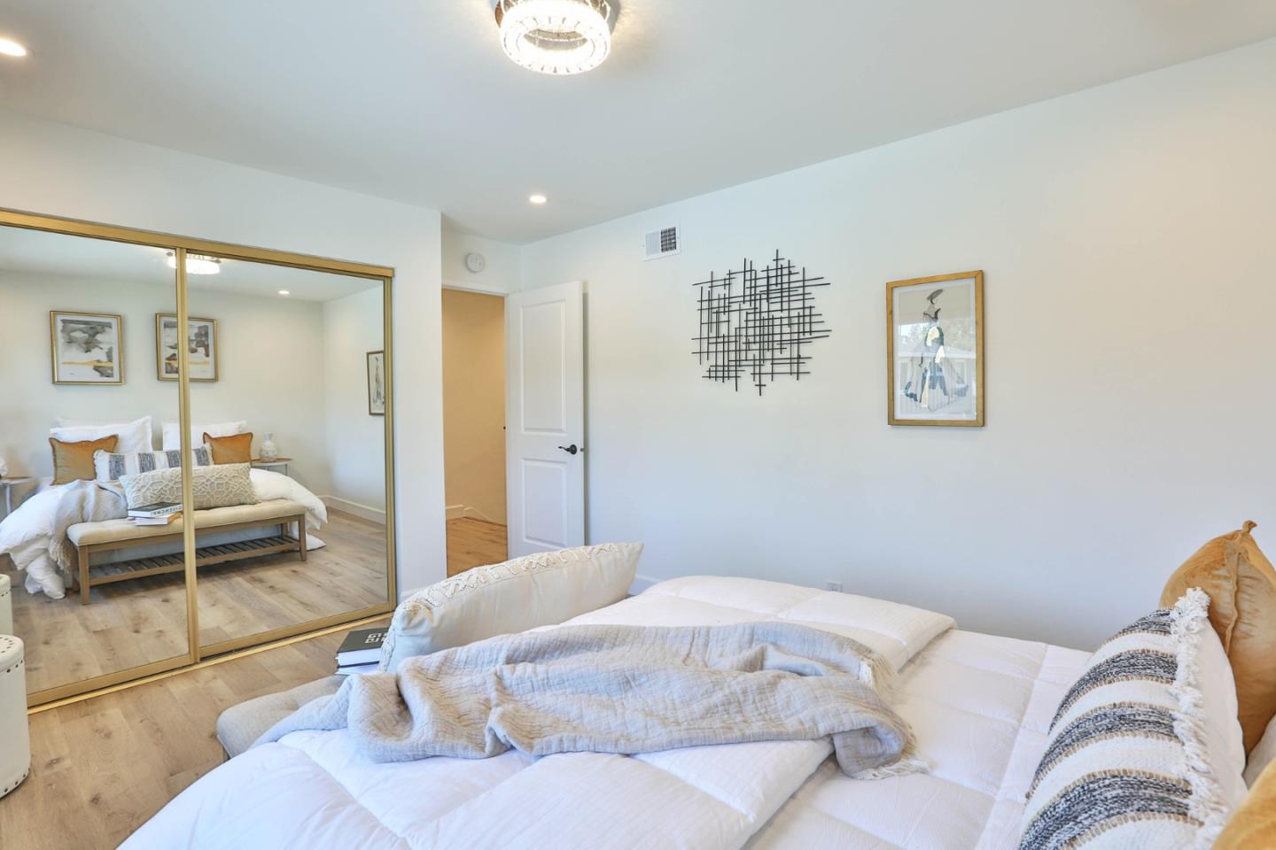 2840 Bollinger Canyon Road San Ramon, CA 94583 - Photo 10 of 23 a bedroom with a large bed and furniture