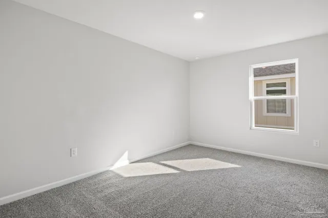 an empty room with a workbench