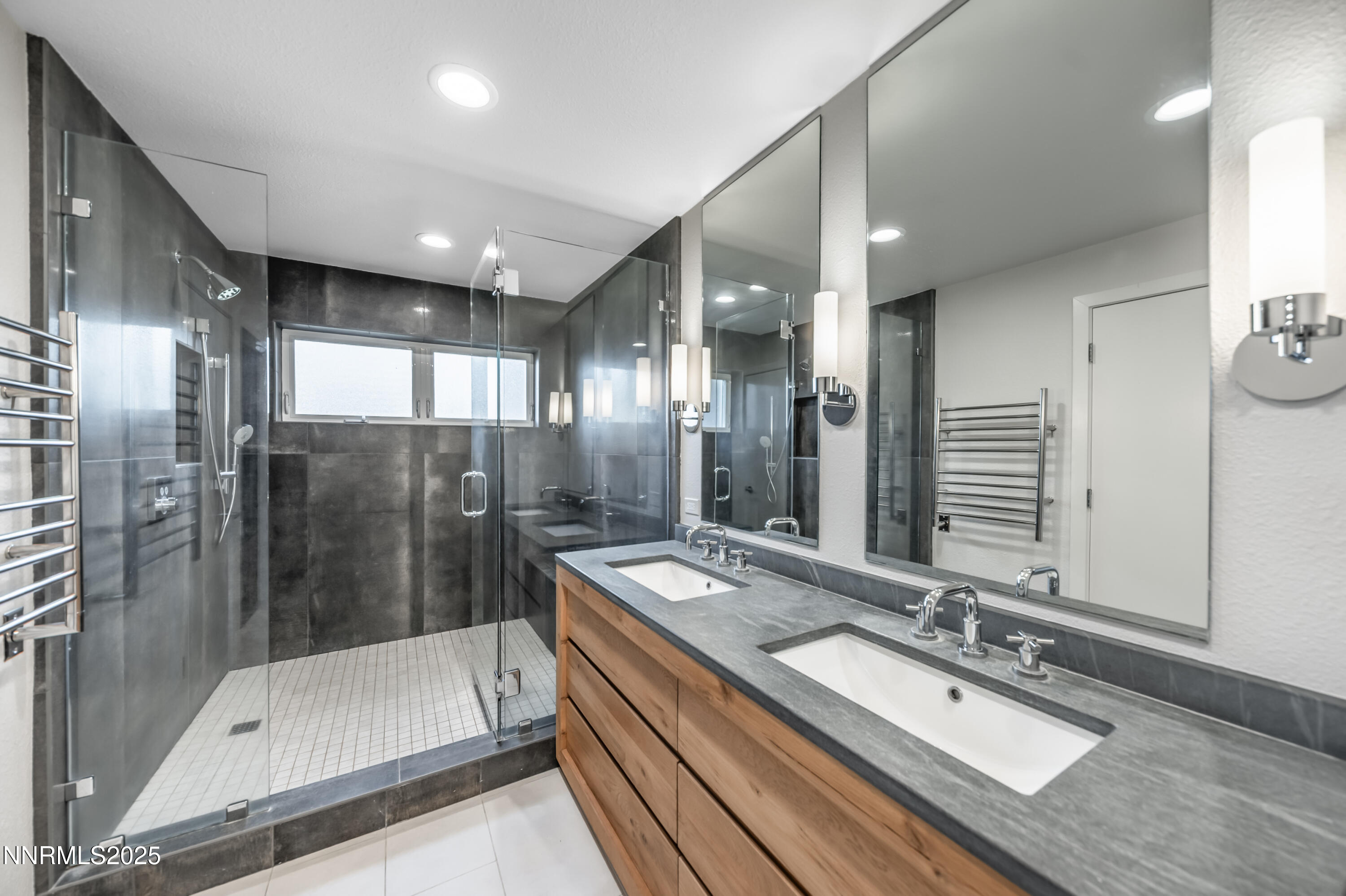 40 MacFarlane Drive Reno, NV 89511 - Photo 17 of 37 a bathroom with a tub shower and sink