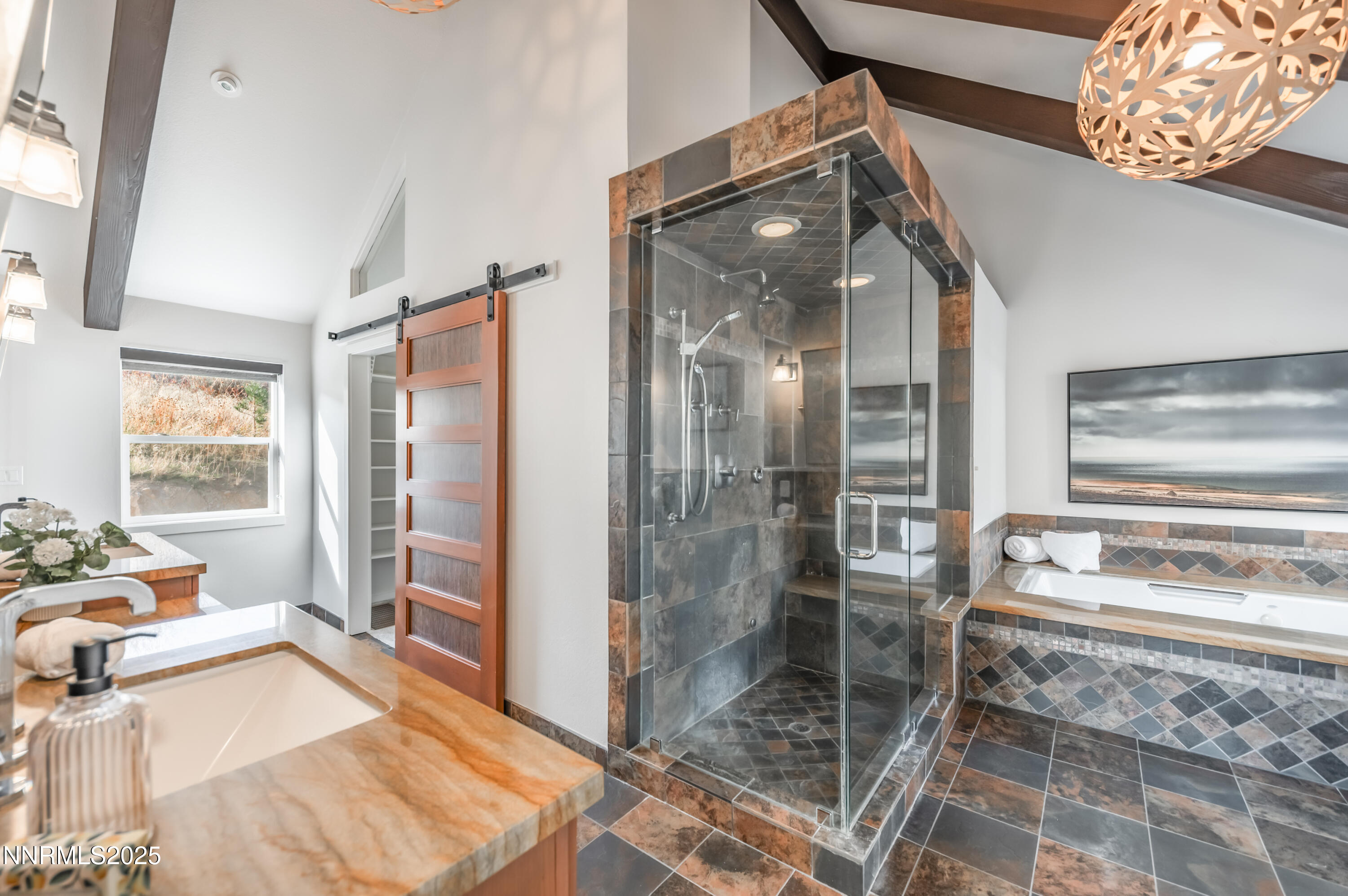 40 MacFarlane Drive Reno, NV 89511 - Photo 20 of 37 a bathroom with a tub and shower