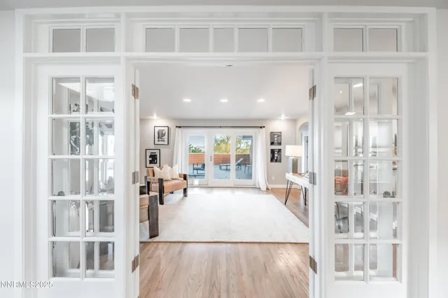 a view of a living room and entry way