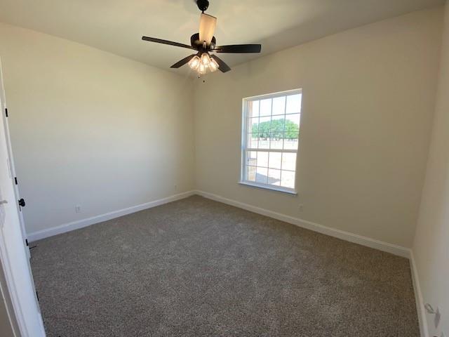 1004 Hennesay Park Springtown, TX 76082 - Photo 17 of 20 an empty room with a window