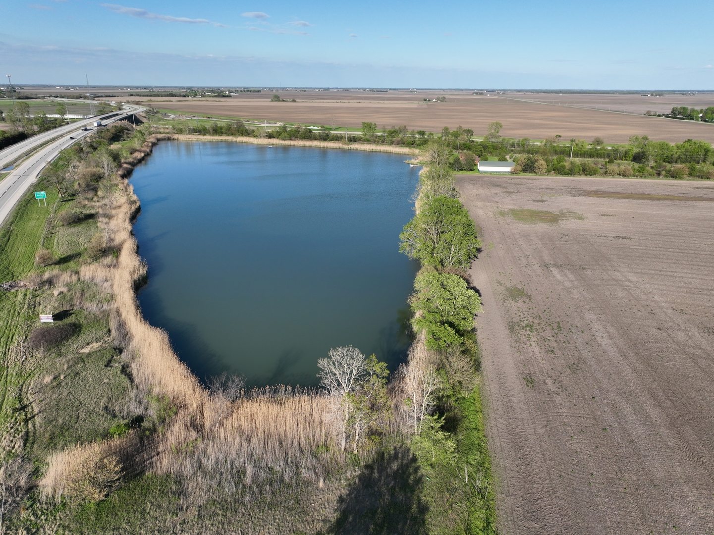 990 East 2800 North Road Clifton, IL 60927 - Photo 7 of 16 a view of a lake with outdoor space