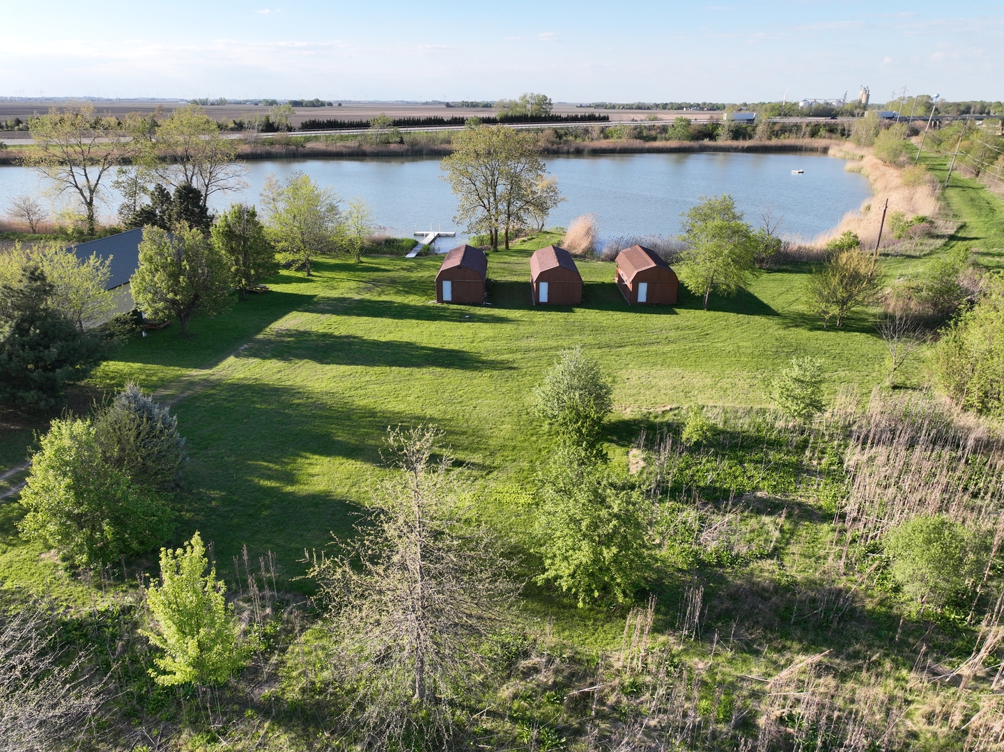 990 East 2800 North Road Clifton, IL 60927 - Photo 10 of 16 a view of a lake with a city