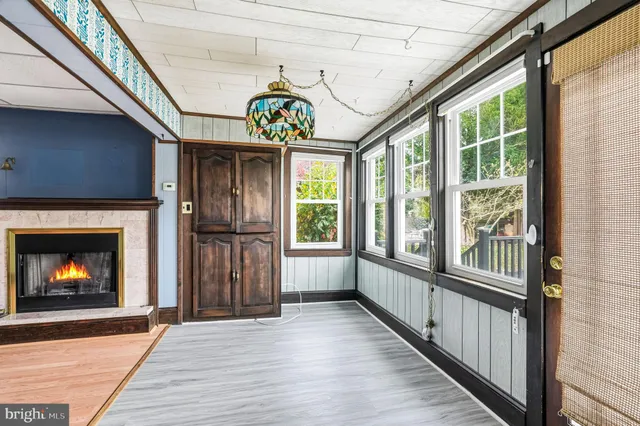 a view of an entryway with a fireplace