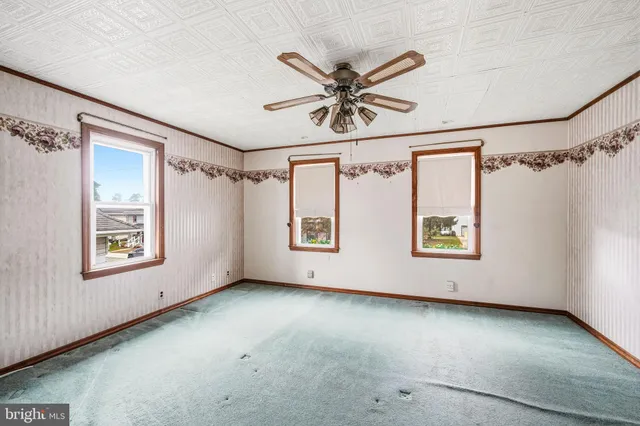 a view of an empty room with window