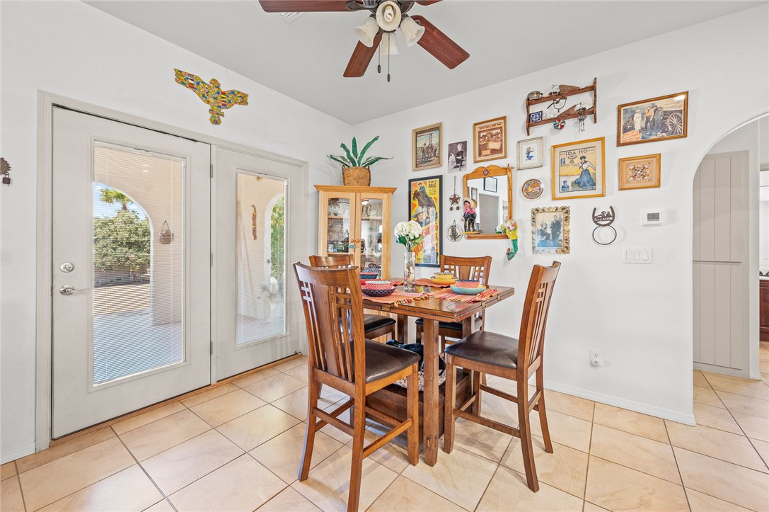 14105 Cactus Road Yucca, AZ 86438 - Photo 17 of 47 a view of a dining room with furniture