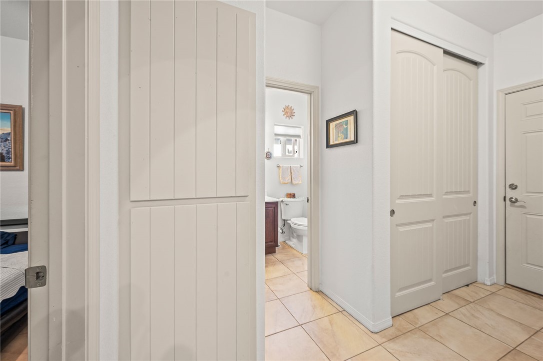 14105 Cactus Road Yucca, AZ 86438 - Photo 22 of 47 a view of a hallway with closet area