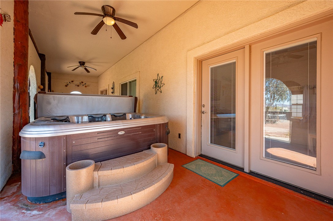 14105 Cactus Road Yucca, AZ 86438 - Photo 26 of 47 a room with furniture and window