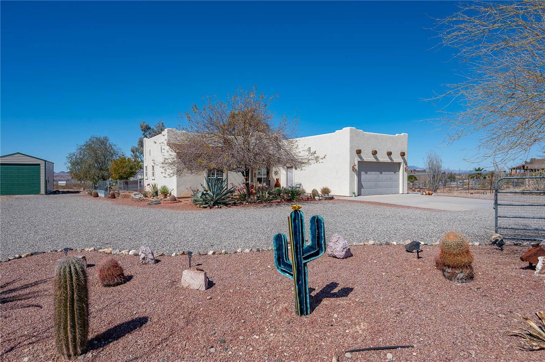 14105 Cactus Road Yucca, AZ 86438 - Photo 7 of 47 a view of the terrace with seating space