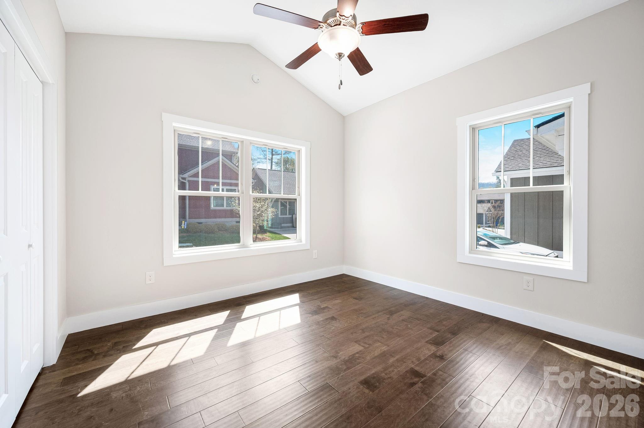 79 Wheeler Road Weaverville, NC 28787 - Photo 12 of 33 a view of an empty room with wooden floor and a window