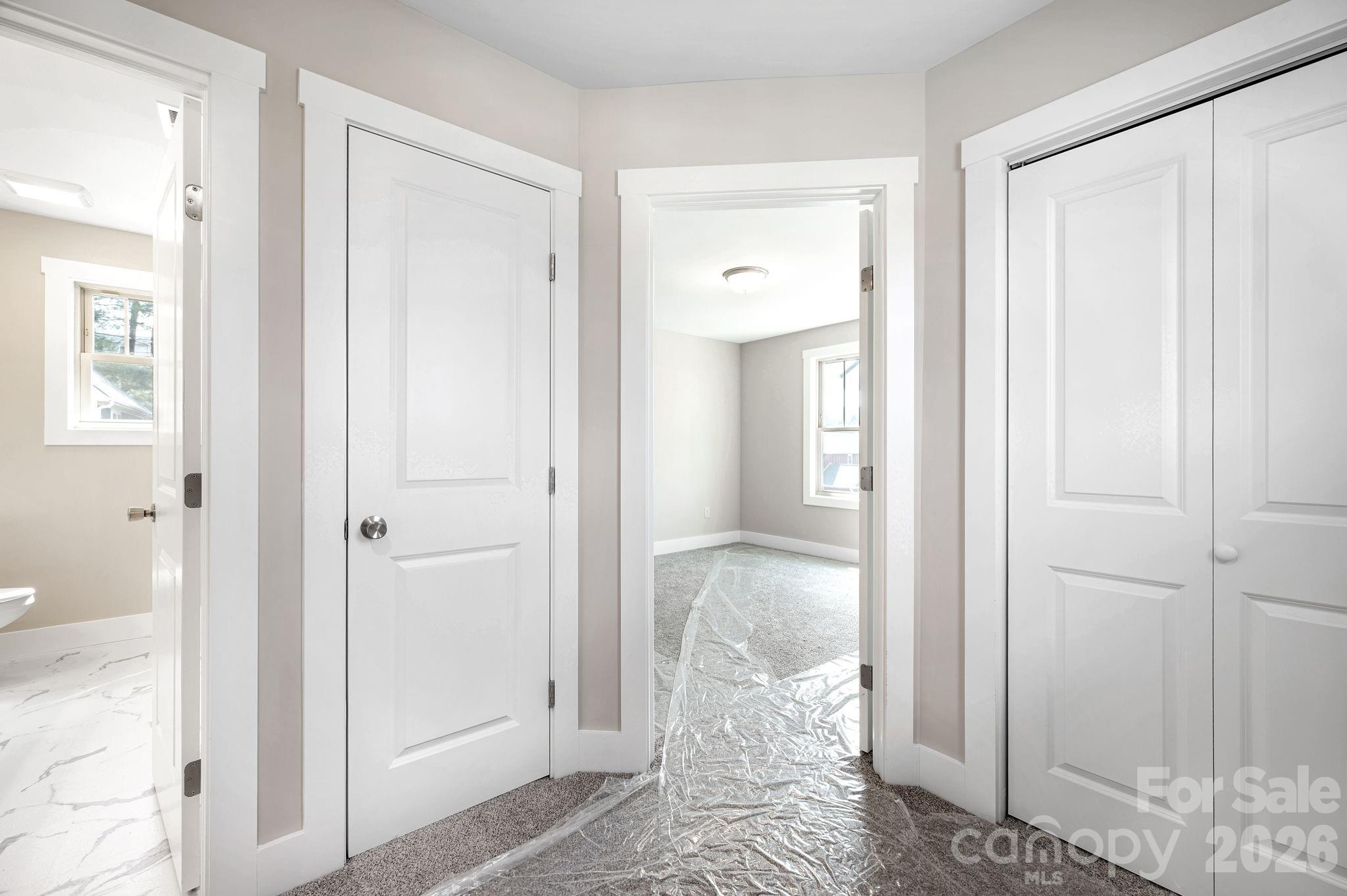 79 Wheeler Road Weaverville, NC 28787 - Photo 20 of 33 a view of a bathroom from a hallway