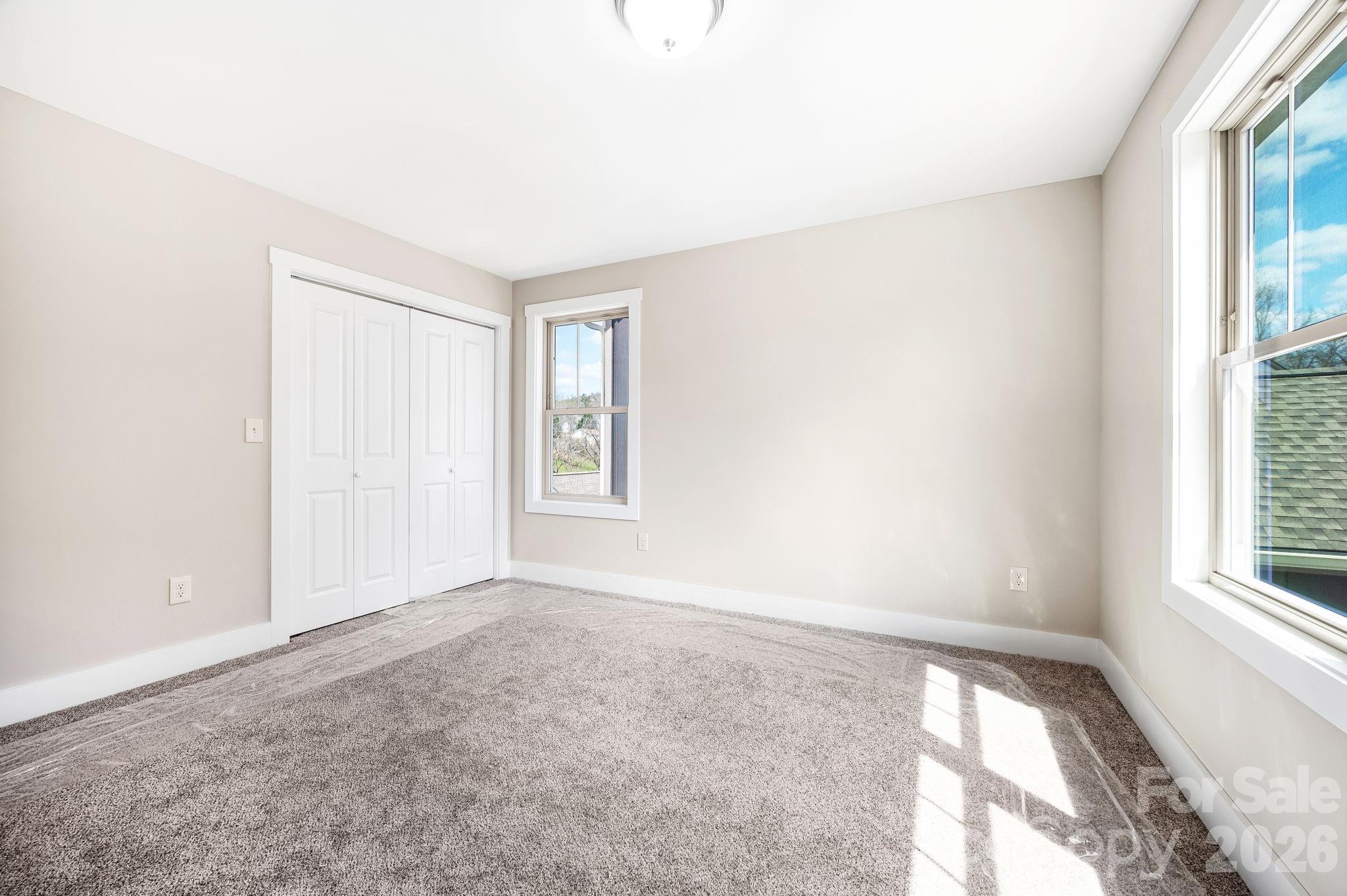 79 Wheeler Road Weaverville, NC 28787 - Photo 21 of 33 an empty room with windows
