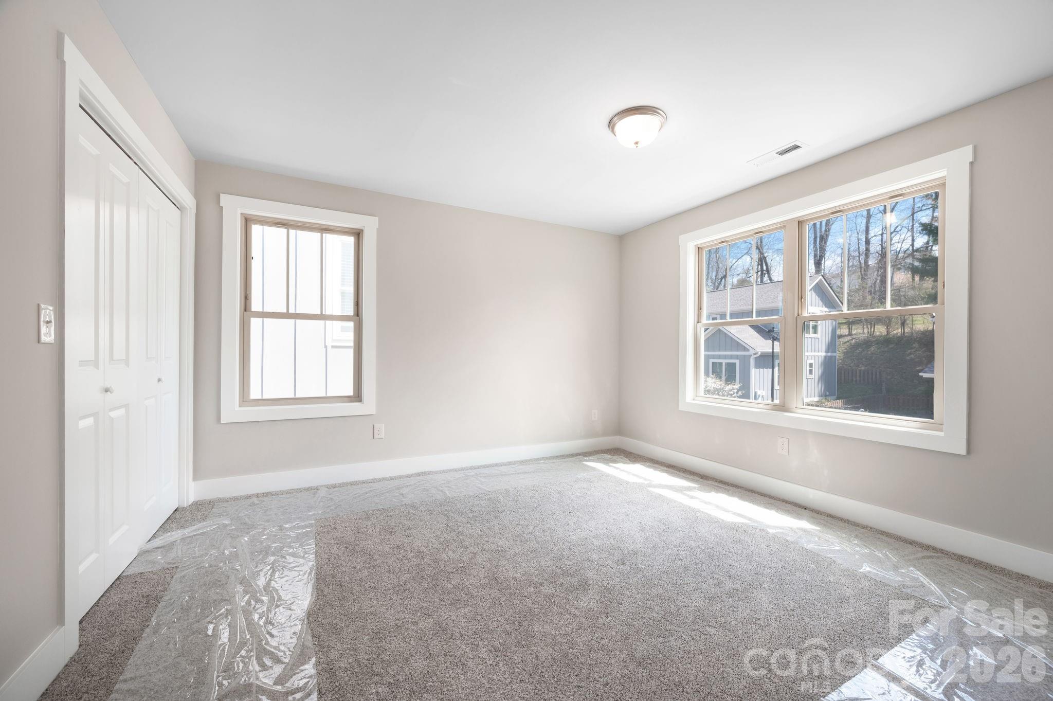 79 Wheeler Road Weaverville, NC 28787 - Photo 22 of 33 a view of an empty room with a window
