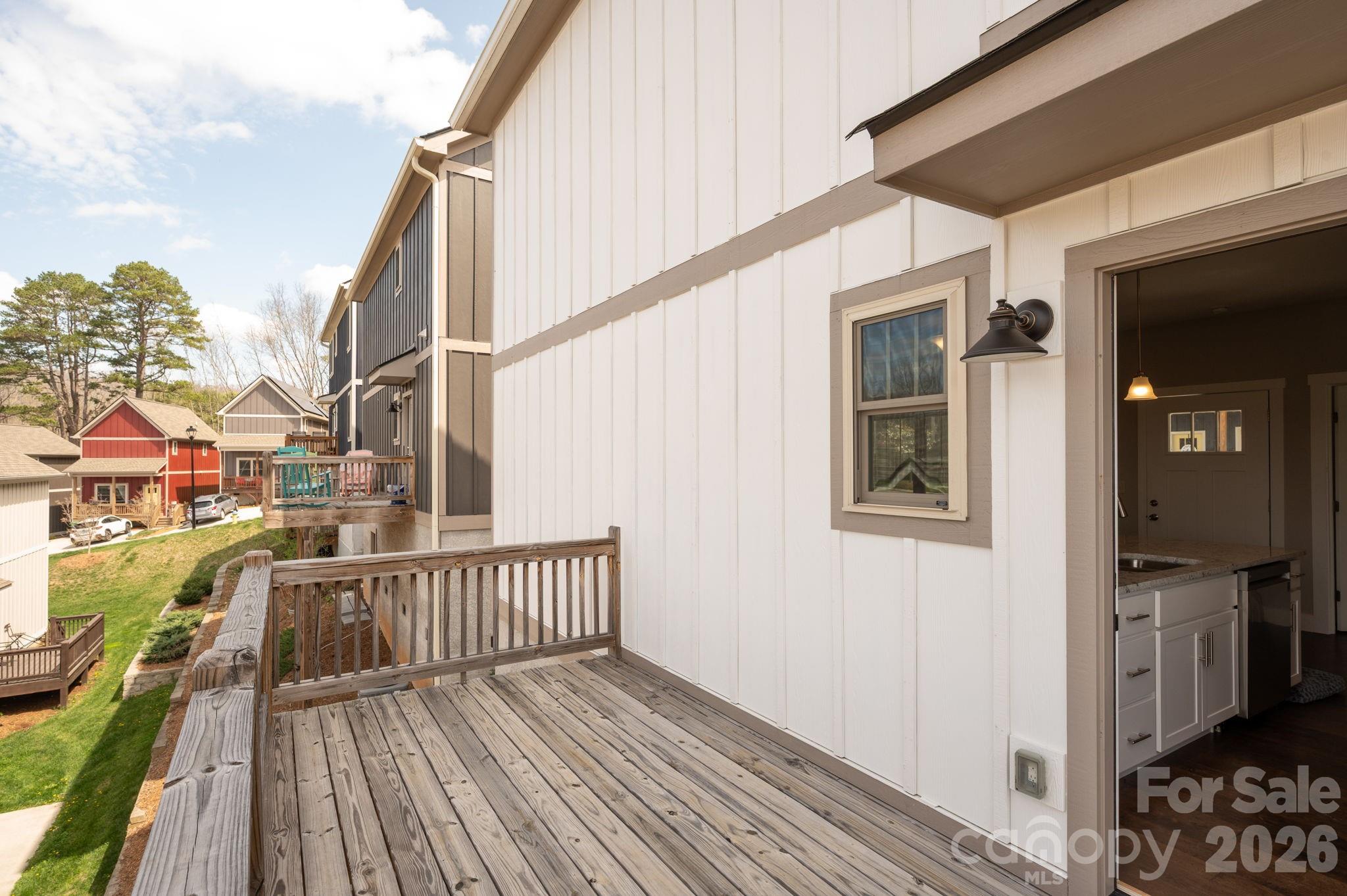 79 Wheeler Road Weaverville, NC 28787 - Photo 27 of 33 a view of a house with a deck