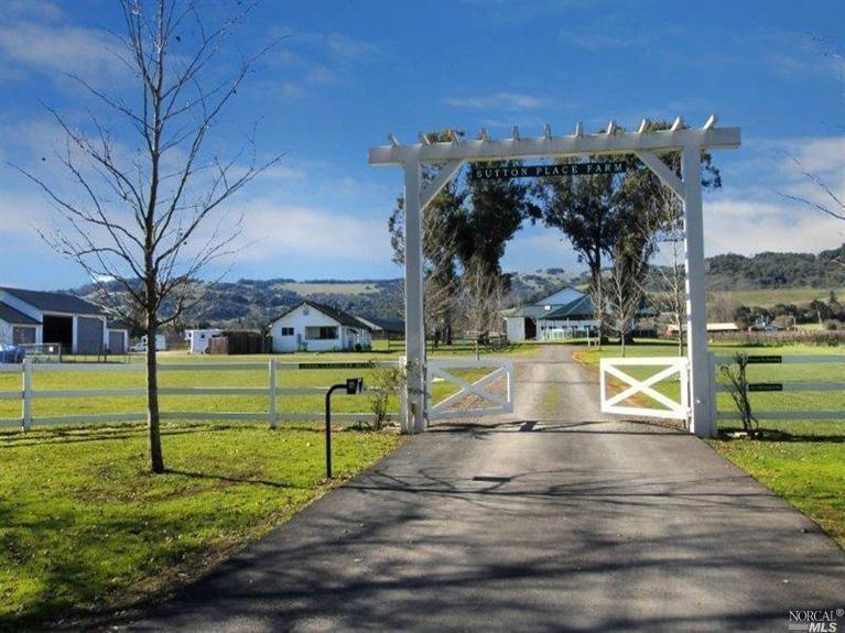 a view of swimming pool with outdoor seating and yard