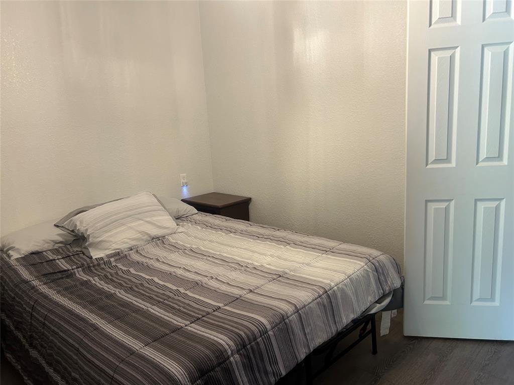 190 Private Road Groesbeck, TX 76642 - Photo 11 of 25 a bedroom with a bed and a cabinets