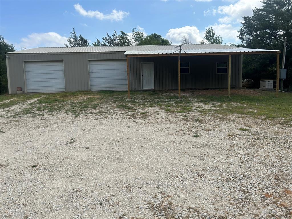 190 Private Road Groesbeck, TX 76642 - Photo 19 of 25 a view of a house with a yard