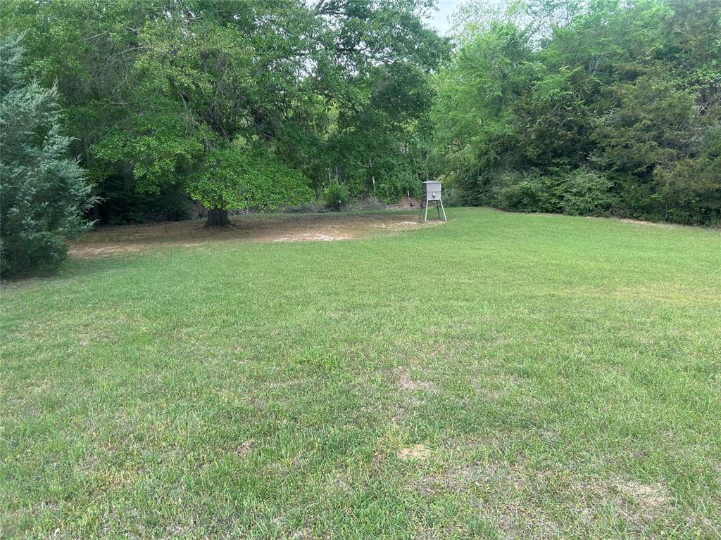 190 Private Road Groesbeck, TX 76642 - Photo 20 of 25 a view of outdoor space with deck and yard