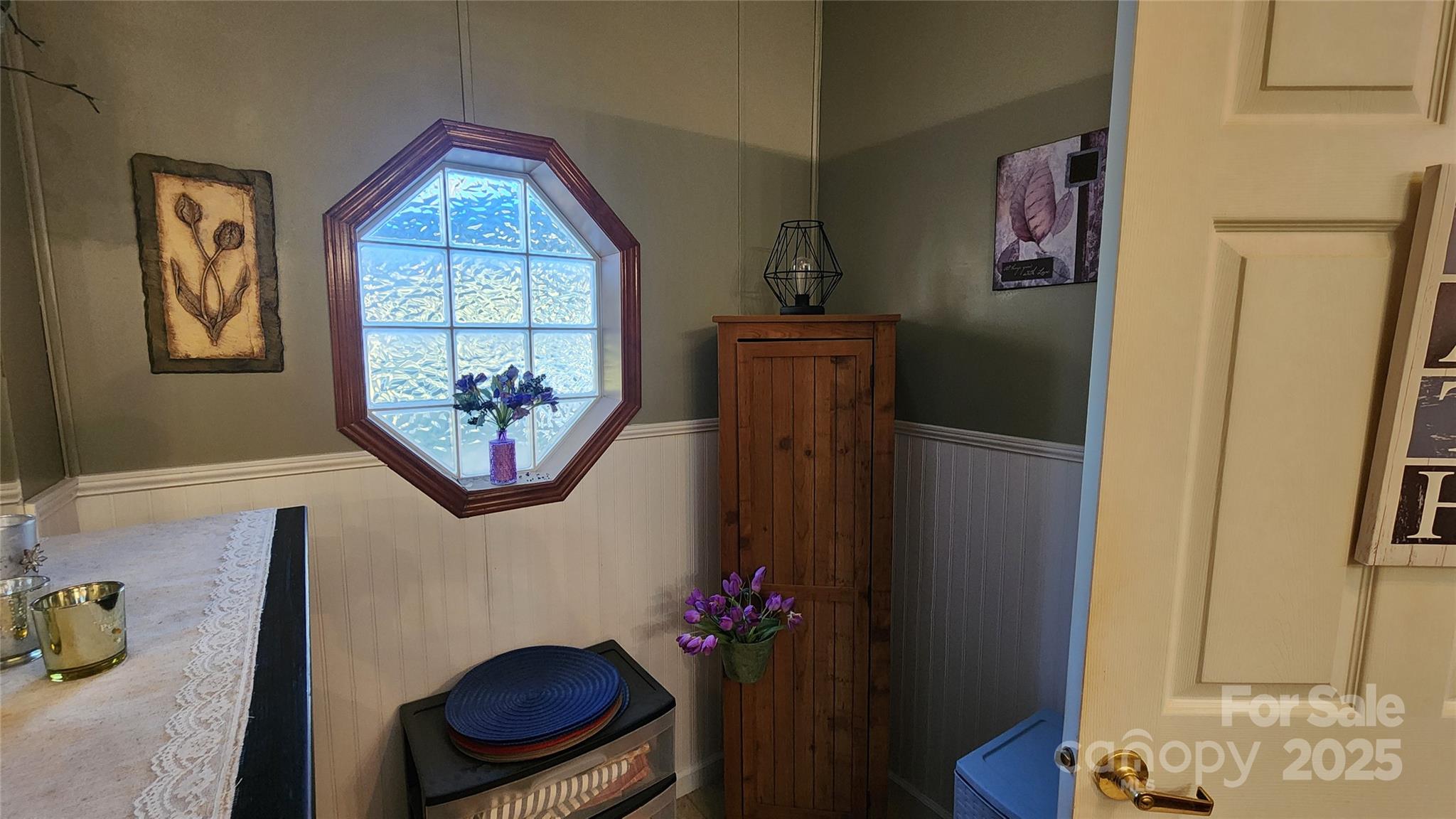 141 Hungry Creek Road Canton, NC 28716 - Photo 17 of 38 a bedroom with a bed and a window