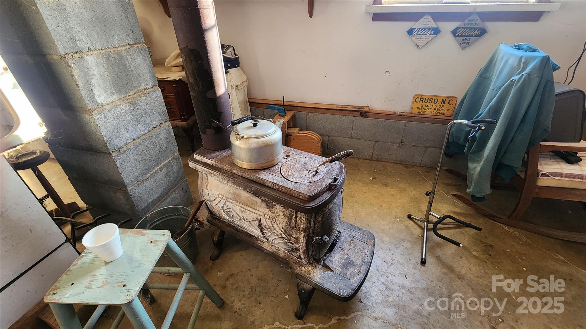 141 Hungry Creek Road Canton, NC 28716 - Photo 37 of 38 a living room with furniture and a flat screen tv