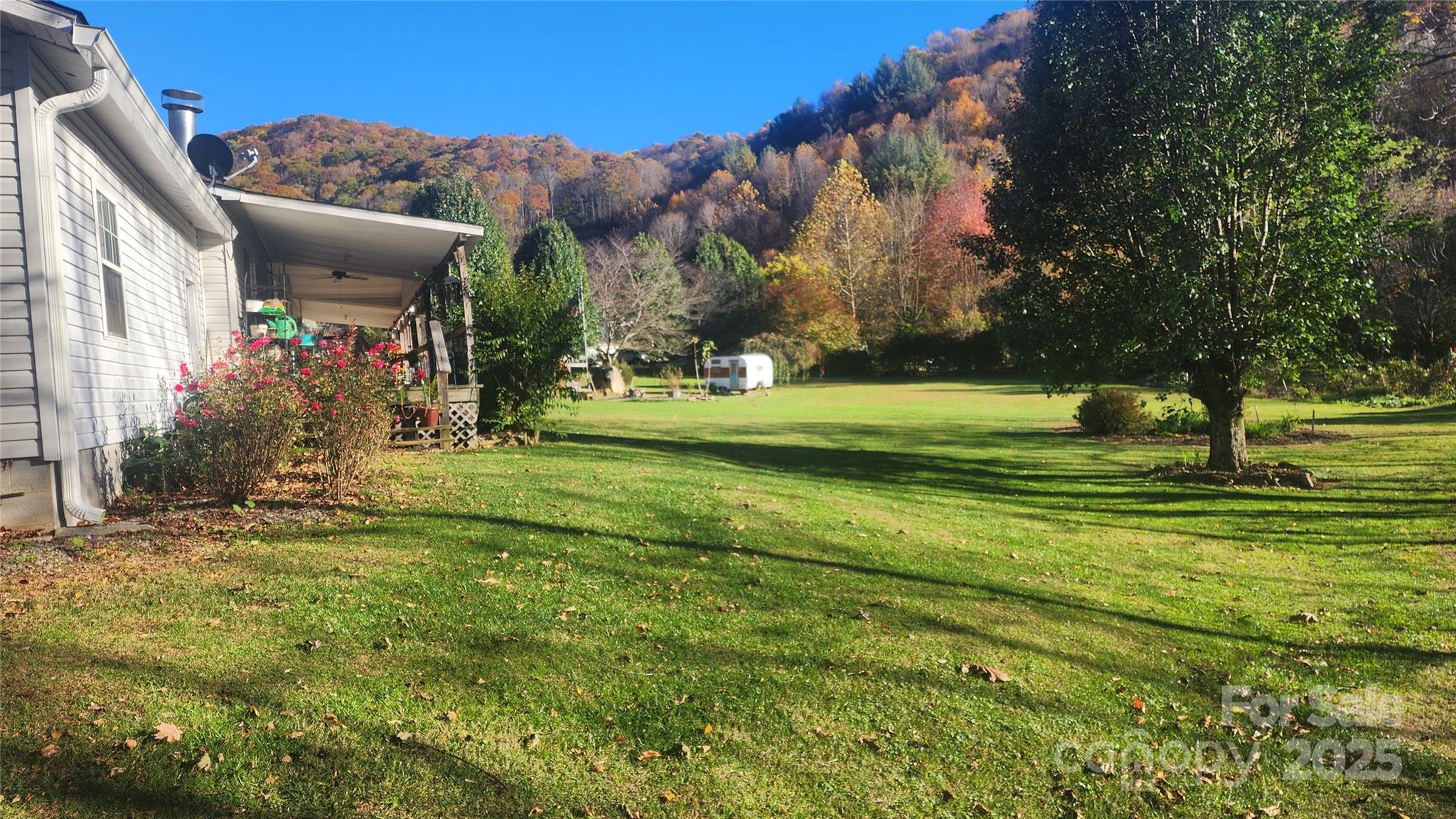 141 Hungry Creek Road Canton, NC 28716 - Photo 4 of 38 a front view of house with a garden