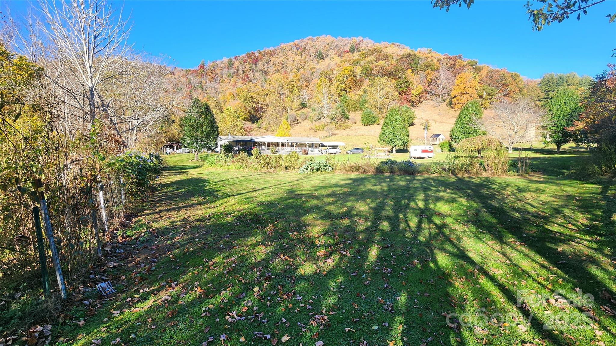 141 Hungry Creek Road Canton, NC 28716 - Photo 7 of 38 a view of a yard with an trees