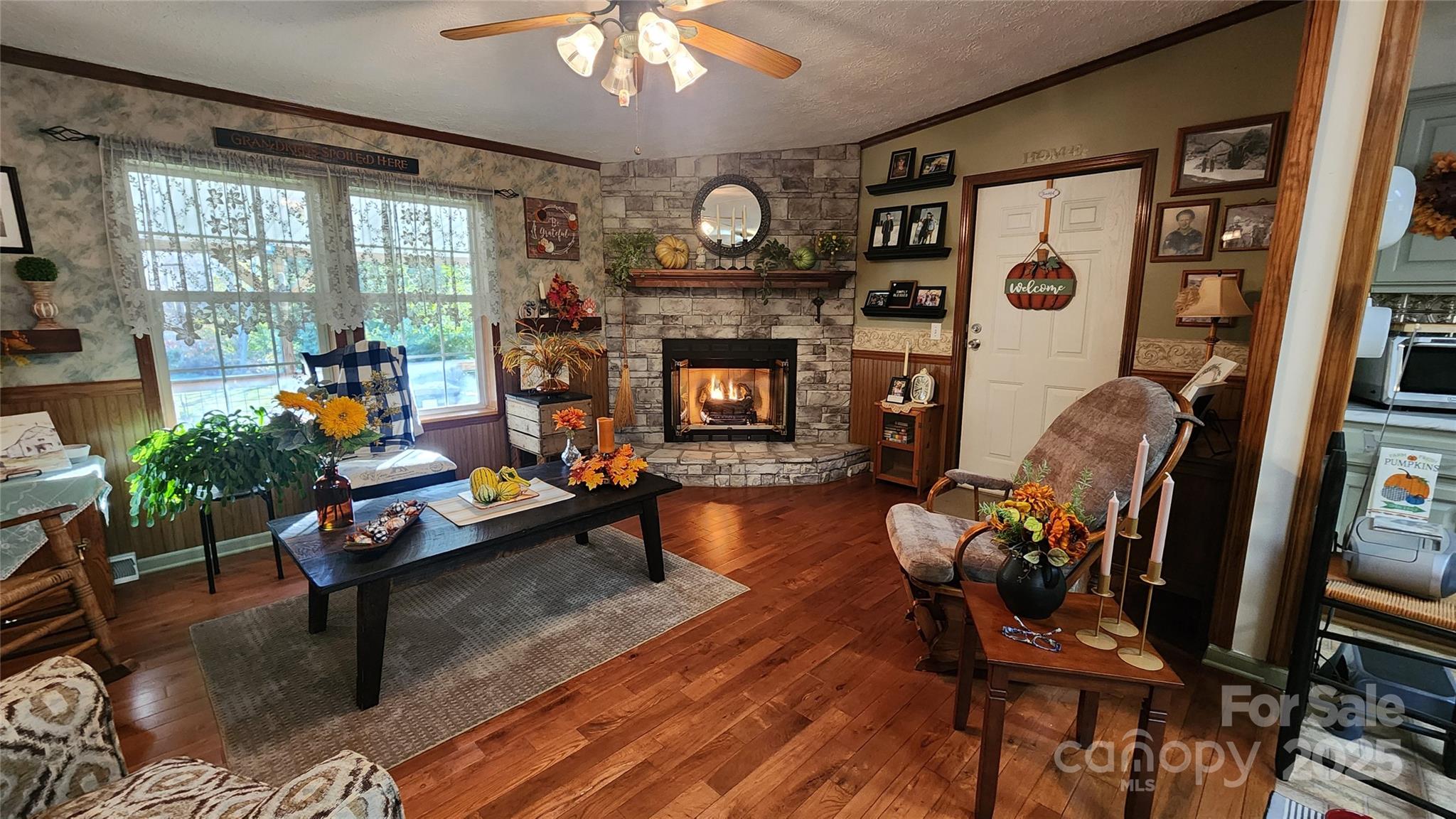 141 Hungry Creek Road Canton, NC 28716 - Photo 10 of 38 a living room with furniture and a fireplace