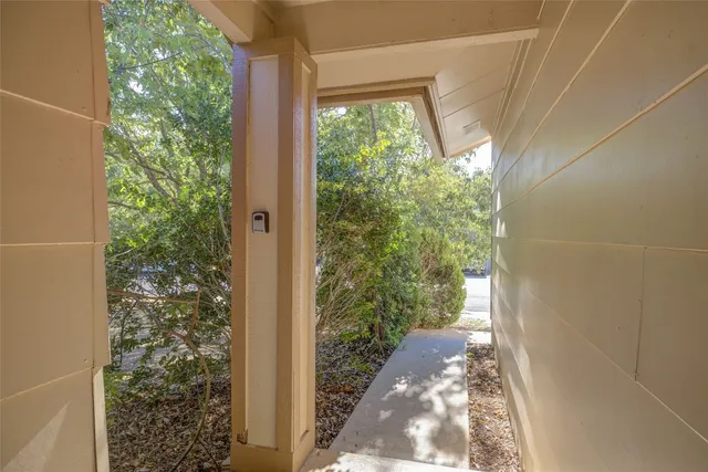 a view of a kitchen cabinets and wooden floor