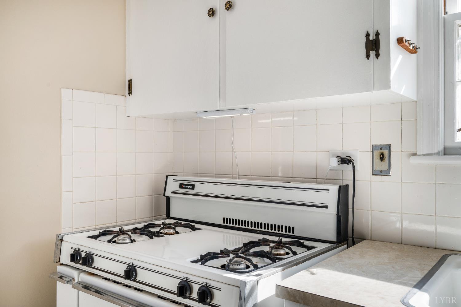 710 Riverside Drive Lynchburg, VA 24503 - Photo 22 of 53 a stove top oven sitting inside of a kitchen