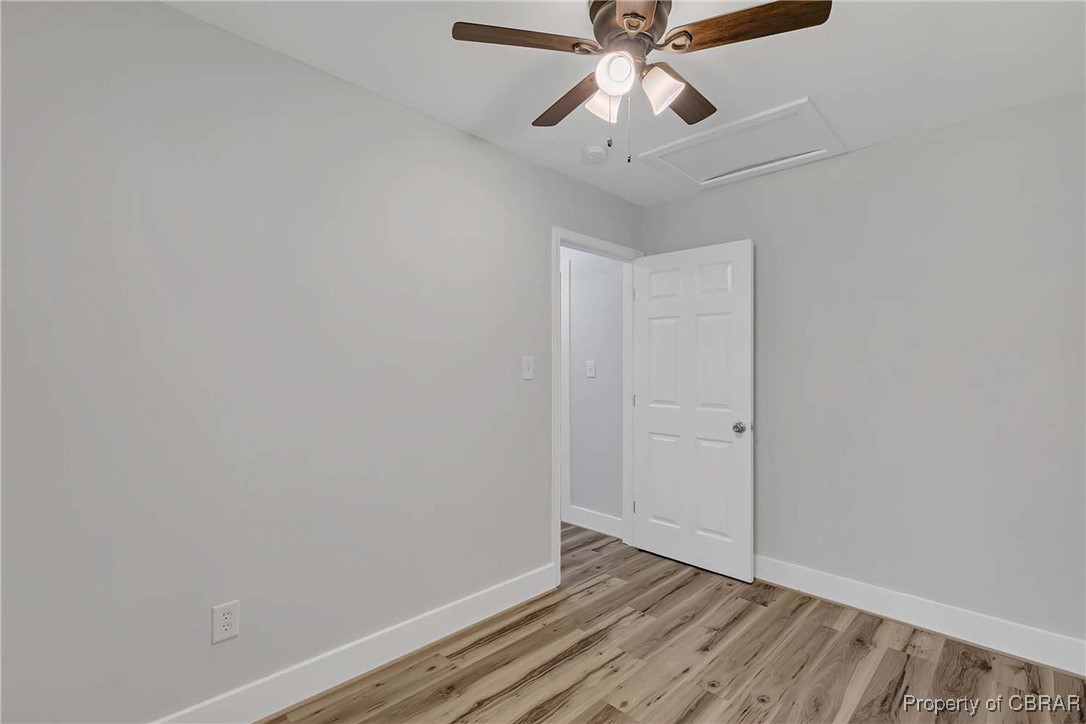 830 Glebe Road Mathews, VA 23109 - Photo 14 of 17 wooden floor in an empty room