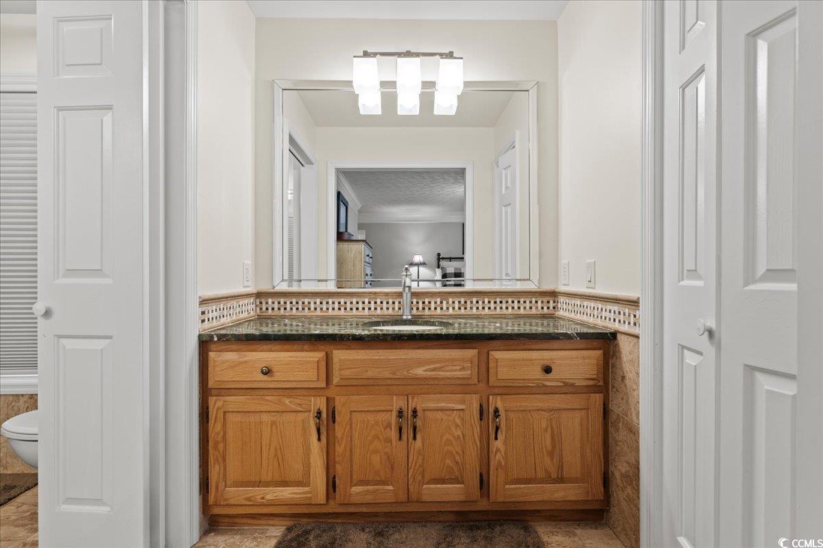 117 John Waites Court Georgetown, SC 29440 - Photo 26 of 40 Bathroom with a closet and vanity