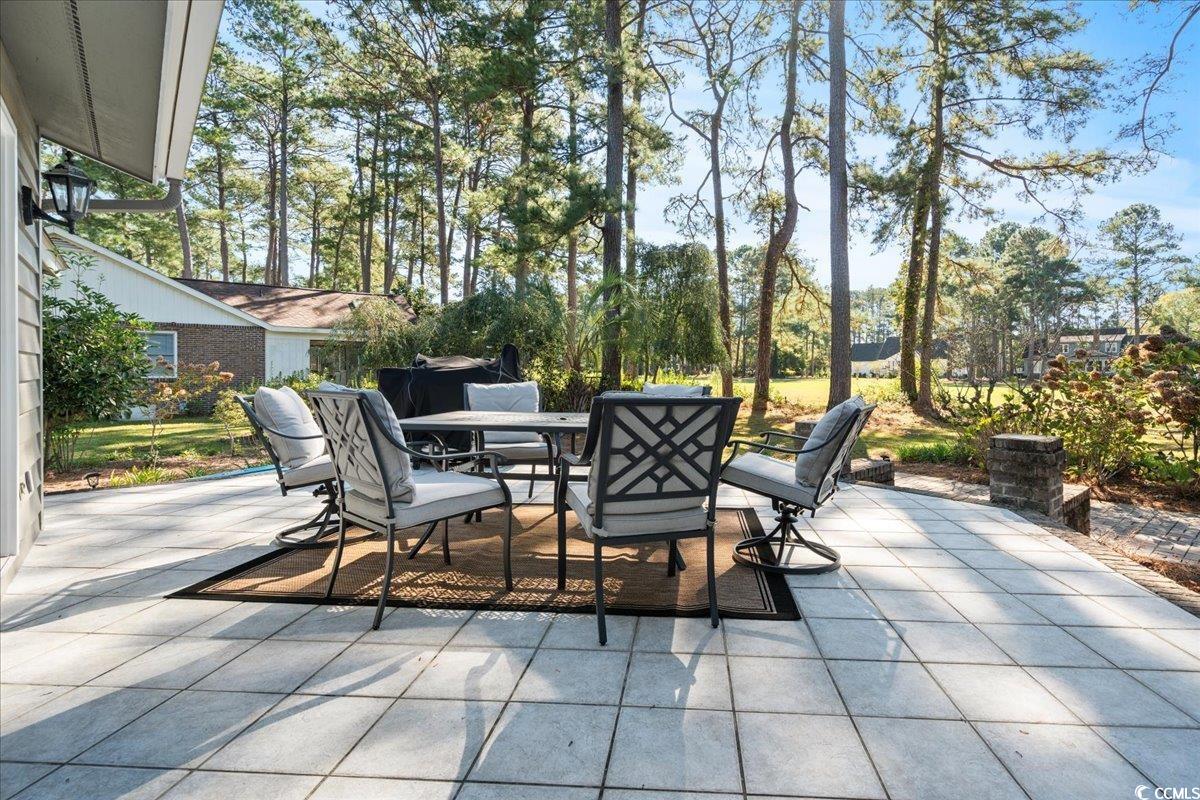 117 John Waites Court Georgetown, SC 29440 - Photo 36 of 40 View of patio featuring outdoor dining space