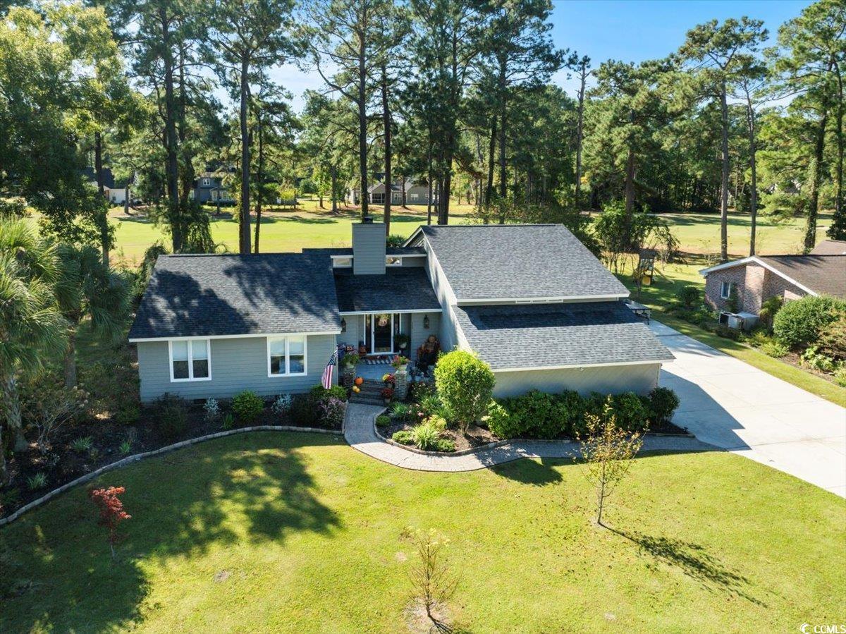 117 John Waites Court Georgetown, SC 29440 - Photo 38 of 40 View of front of house with a front lawn, view of scattered trees, and driveway