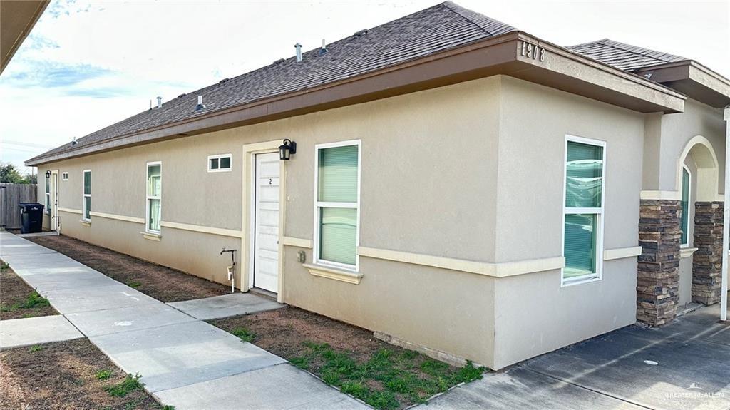 a front view of a house with a garage