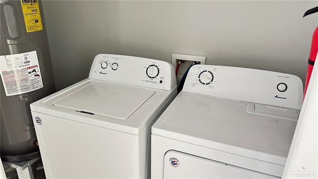 1908 Harrison Street, Unit 14 Weslaco, TX 78599 - Photo 6 of 10 a utility room with dryer and washer