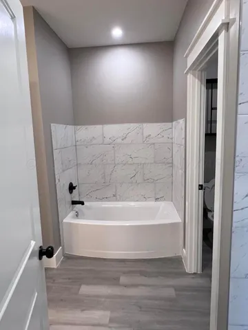 a bathroom with a bathtub