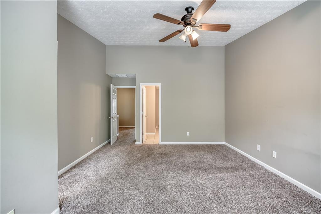 2913 Vining Ridge Terrace Decatur, GA 30034 - Photo 19 of 28 a view of an empty room with a fan