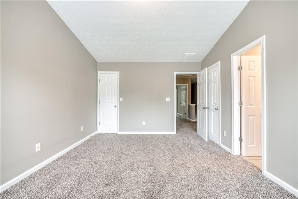 2913 Vining Ridge Terrace Decatur, GA 30034 - Photo 23 of 28 a view of an empty room with closet and a window