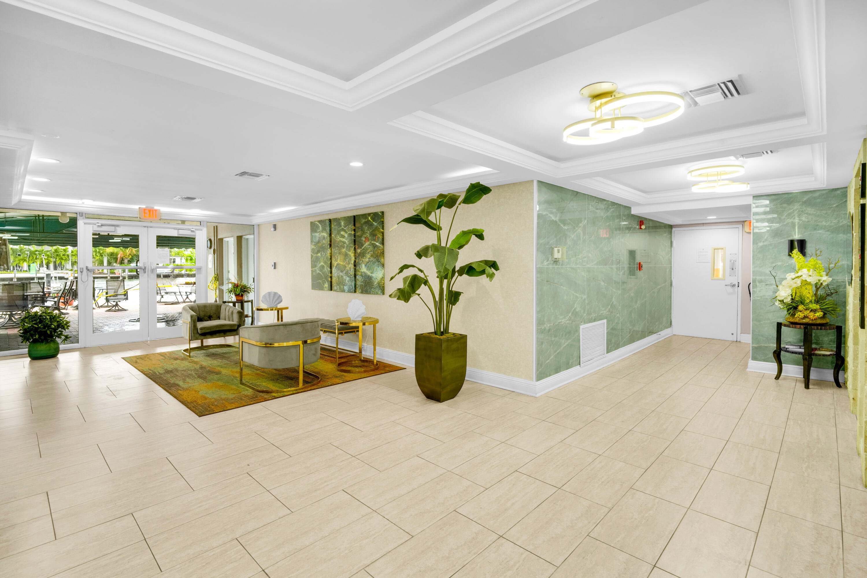 2611 North Riverside Drive, Unit 1004 Pompano Beach, FL 33062 - Photo 16 of 32 a view of a livingroom with furniture and window