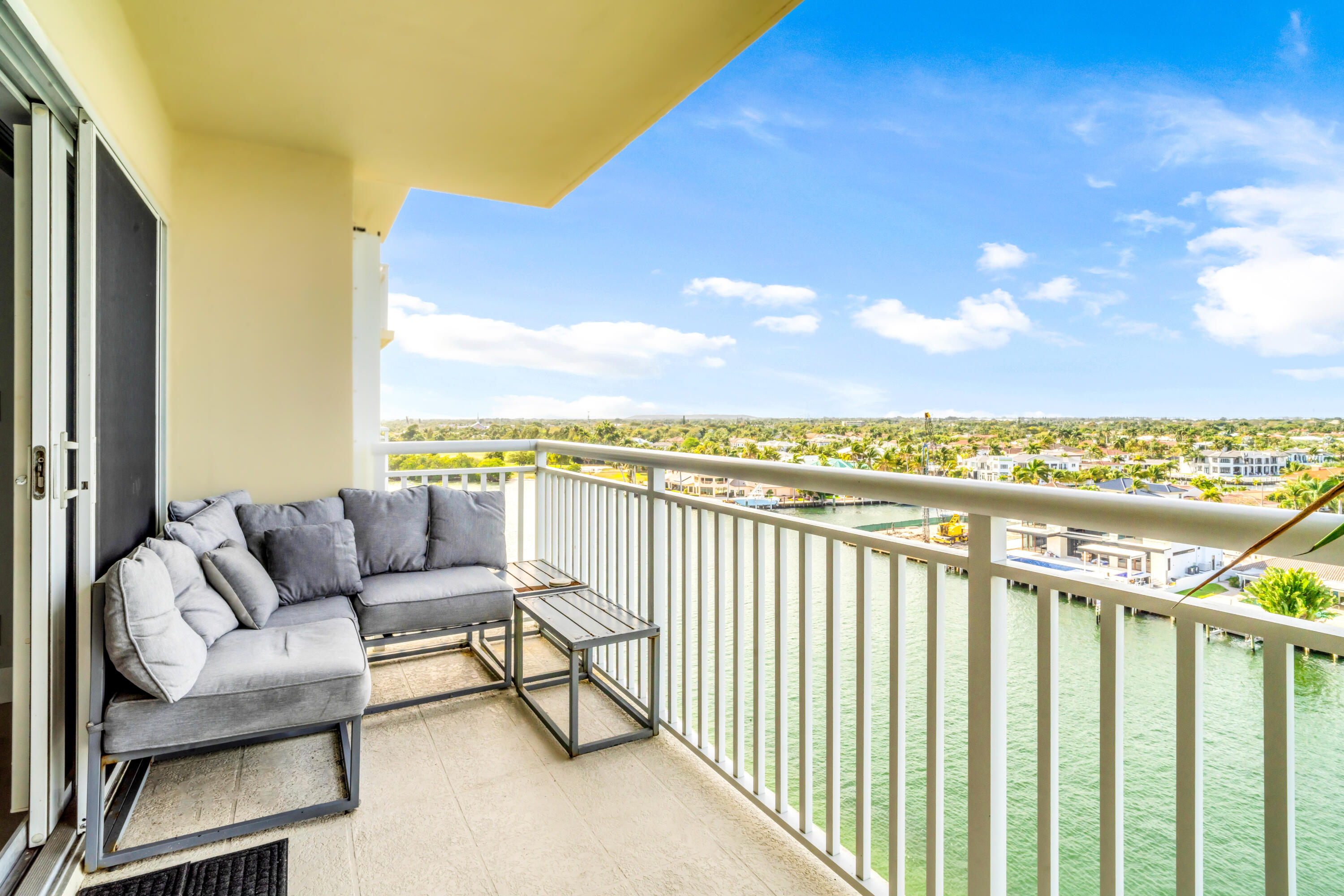 2611 North Riverside Drive, Unit 1004 Pompano Beach, FL 33062 - Photo 27 of 32 a balcony with furniture and city view