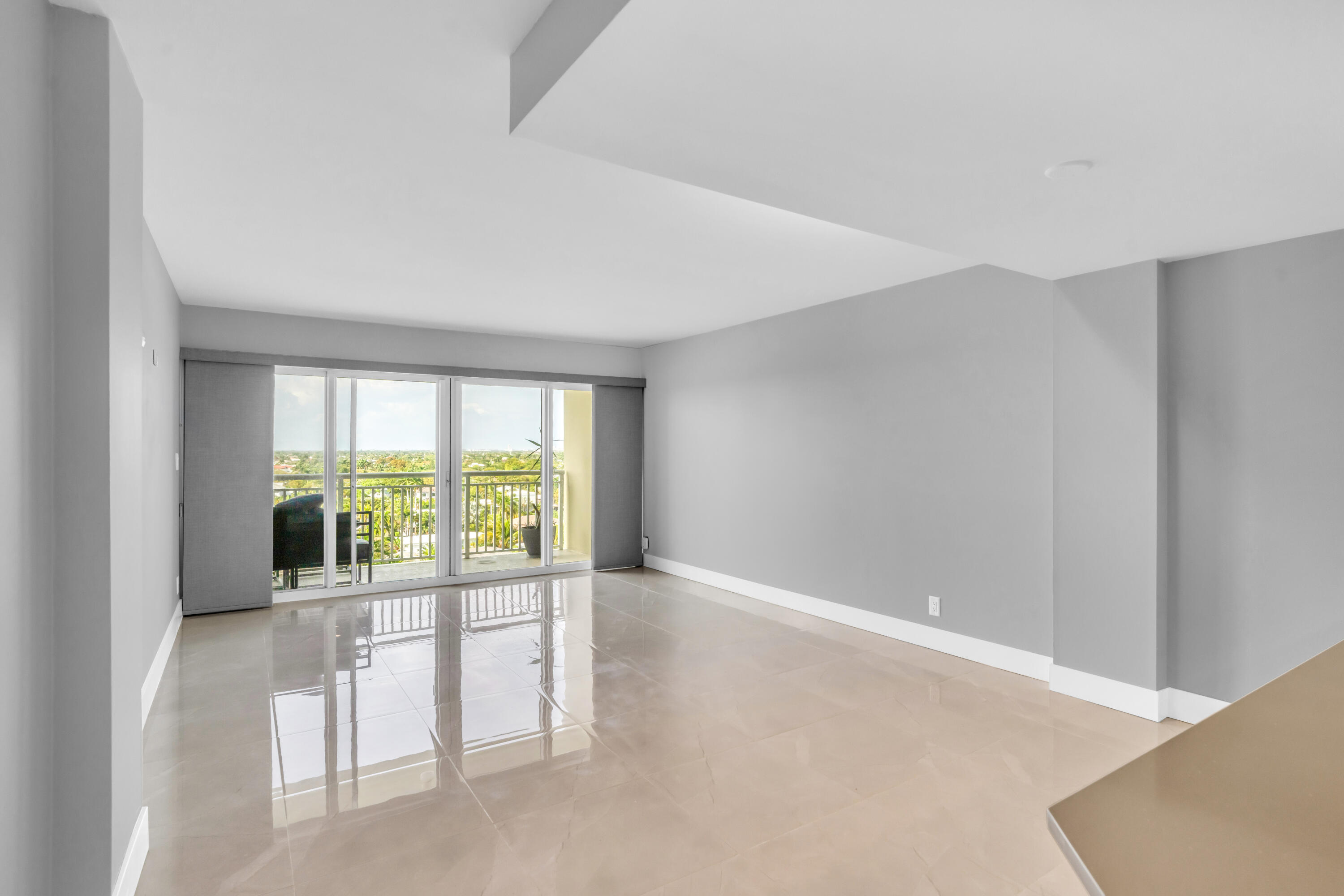 2611 North Riverside Drive, Unit 1004 Pompano Beach, FL 33062 - Photo 9 of 32 a view of an empty room with a window