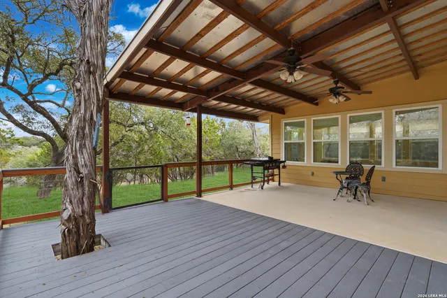 a swimming pool with wooden fence