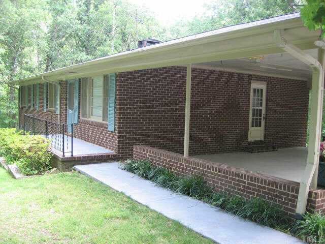 704 Torredge Road Durham, NC 27712 - Photo 3 of 7 a front view of a house with garden