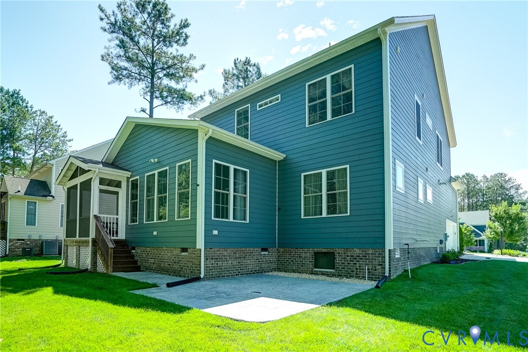4669 Woburn Road Providence Forge, VA 23140 - Photo 61 of 78 a view of a house with a yard