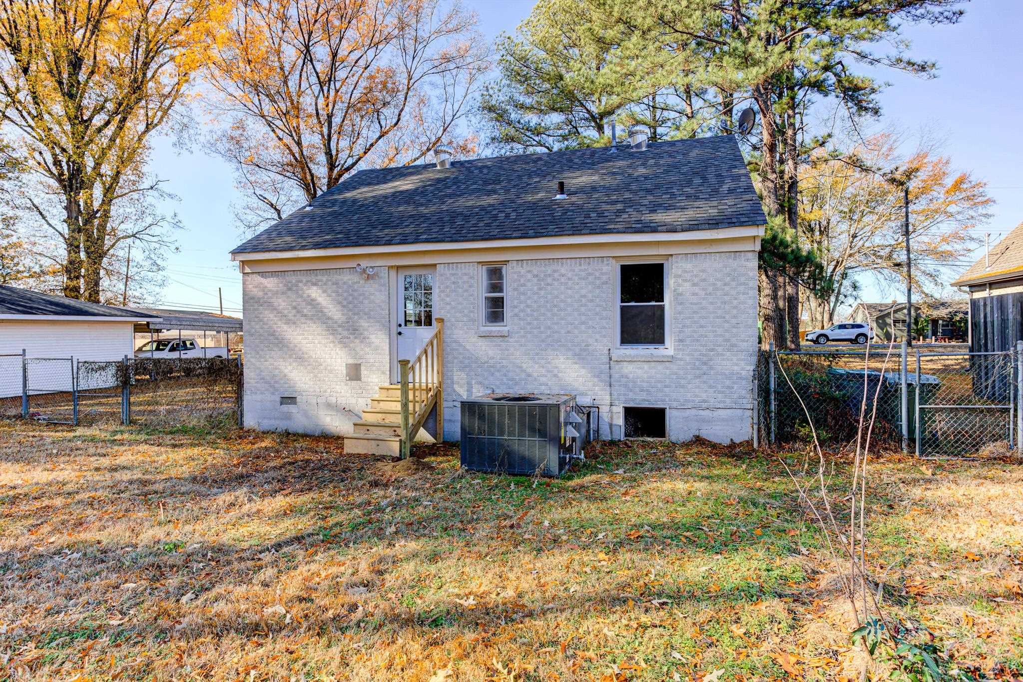 1178 Dovecrest Road Memphis, TN 38134 - Photo 20 of 20 a view of a house with a yard