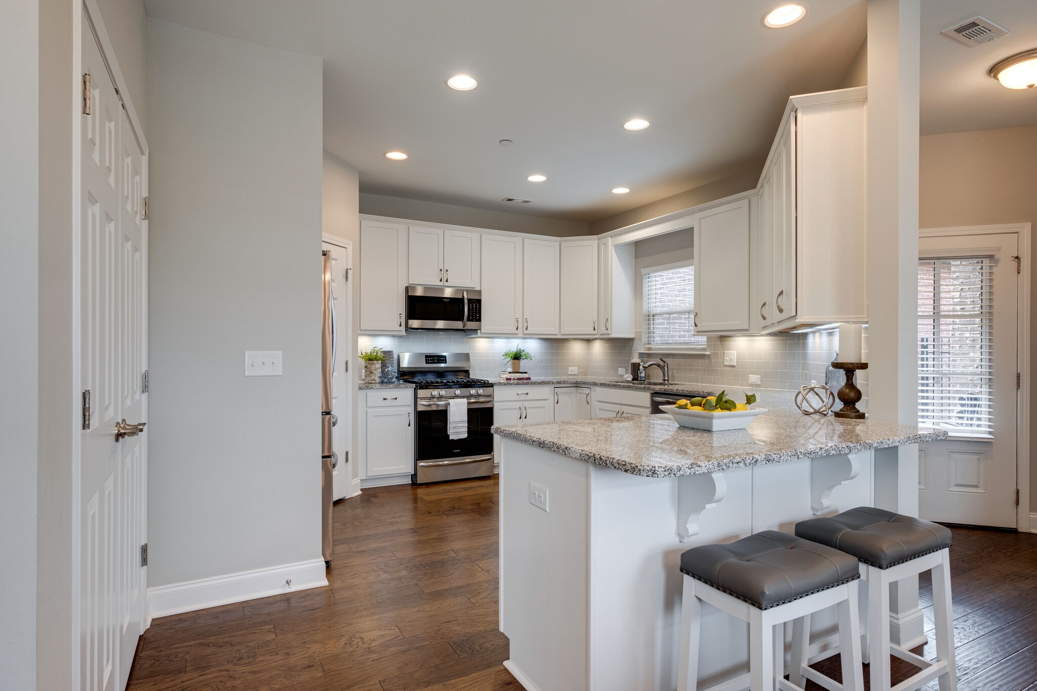 620 Weybridge Drive Nolensville, TN 37135 - Photo 19 of 33 a kitchen with stainless steel appliances granite countertop a refrigerator and a stove top oven