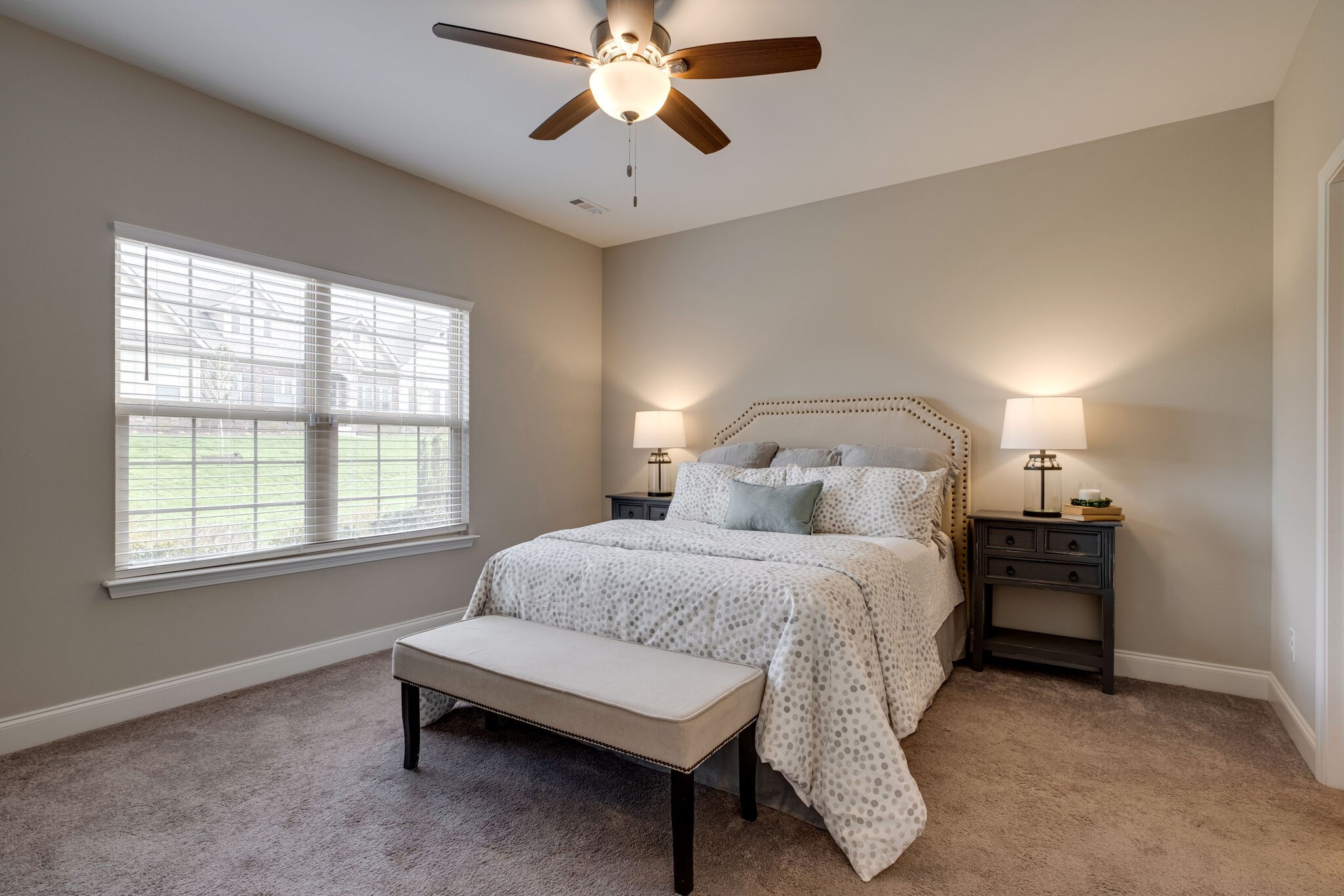 620 Weybridge Drive Nolensville, TN 37135 - Photo 21 of 33 a bedroom with a bed and a chandelier