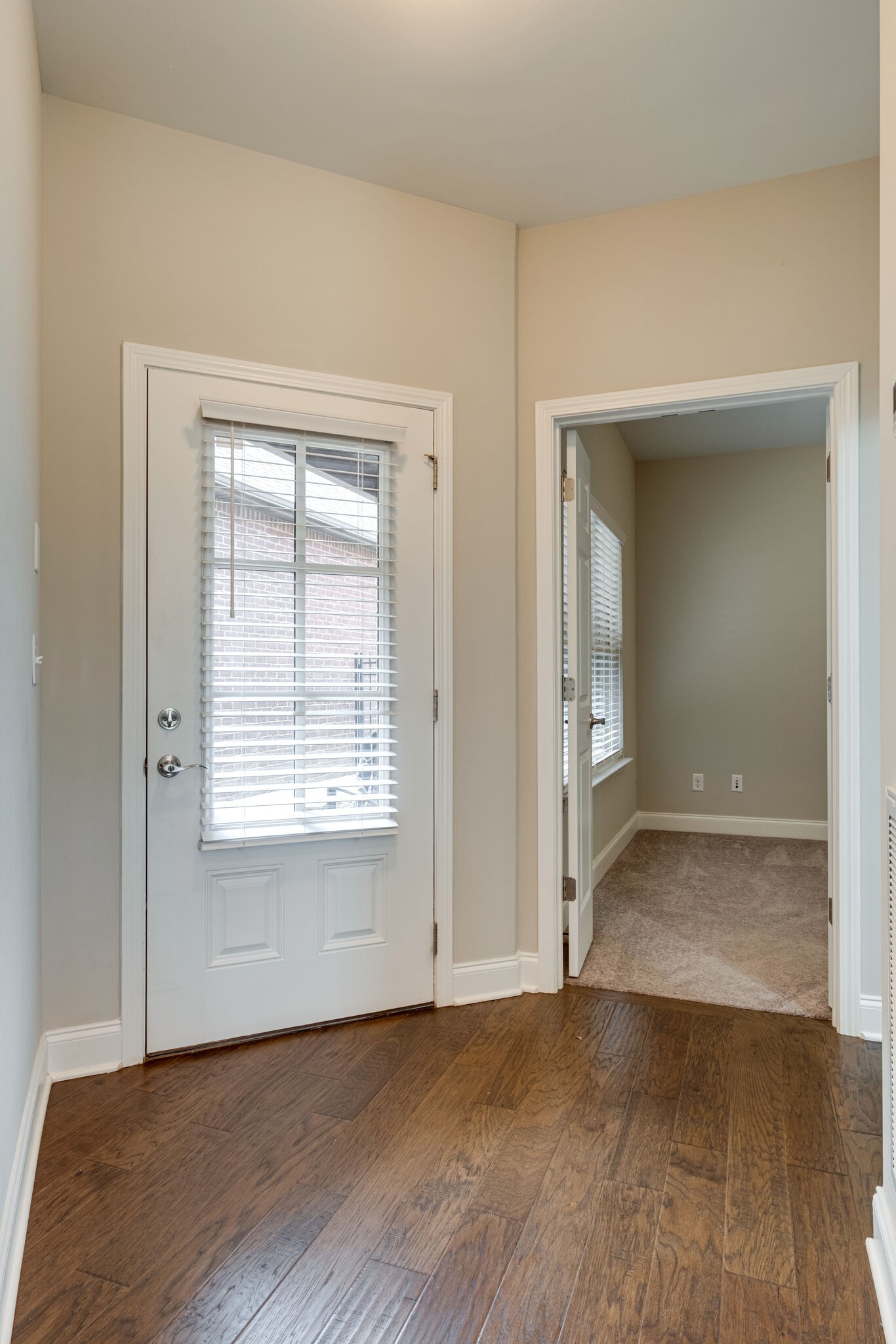620 Weybridge Drive Nolensville, TN 37135 - Photo 26 of 33 an empty room with wooden floor and a window